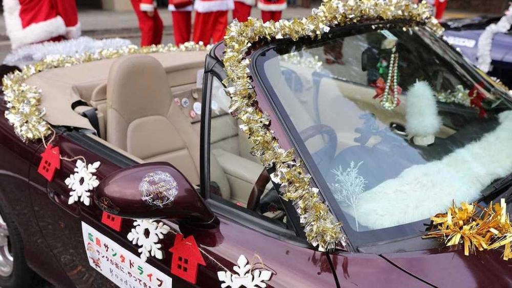 Mazda “biến hình” thành ông già Noel làm từ thiện - anh 8.