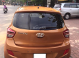 Hyundai i10 2014 - Mình bán Hyundai i10 Hatback năm 2014, màu vàng