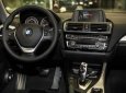 BMW 1 Series 118i  2016 - Cần bán gấp BMW 118i đời 2016, màu đen, xe nhập