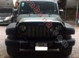 Jeep Wrangler Unlimited Sport 2010 - Cần bán gấp Jeep Wrangler Unlimited Sport 2010, màu đen, xe nhập chính chủ