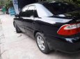 Mazda 626 2003 - Xe Mazda 626 năm 2003, màu đen