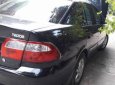 Mazda 626 2003 - Xe Mazda 626 năm 2003, màu đen