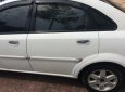 Daewoo Lacetti 2002 - Cần bán gấp Daewoo Lacetti đời 2002 màu trắng, giá 222 triệu