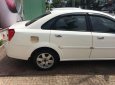 Daewoo Lacetti 2002 - Cần bán gấp Daewoo Lacetti đời 2002 màu trắng, giá 222 triệu