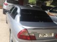 Mitsubishi Lancer 2000 - Cần bán Mitsubishi Lancer đời 2000, màu bạc