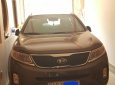 Kia Sorento 2014 - Cần bán xe Kia Sorento XM 24G E2 AT-2WD, đời tháng 11/2014, màu nâu, máy xăng