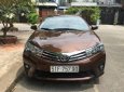 Toyota Corolla altis  AT 2016 - Bán xe cũ Toyota Corolla altis AT đời 2016, màu nâu