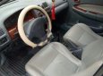 Mazda 323F   1999 - Cần bán gấp Mazda 323F đời 1999, màu đen, nhập khẩu