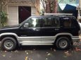 Isuzu Trooper 2010 - Bán Isuzu Trooper đời 2010, màu đen giá cạnh tranh