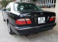 Mercedes-Benz E240 2002 - Cần bán Mercedes-Benz E240 đăng ký 2002, màu đen ít sử dụng, 207tr