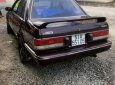 Mazda 323 1988 - Cần bán gấp Mazda 323 sản xuất 1988, màu nâu