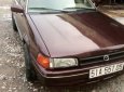 Mazda 323 1988 - Cần bán gấp Mazda 323 sản xuất 1988, màu nâu