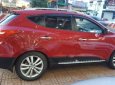 Hyundai Tucson 4WD 2012 - Xe Hyundai Tucson 4WD năm 2012, màu đỏ, xe nhập, 700tr