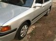 Mazda 323   1995 - Bán xe cũ Mazda 323 đời 1995, màu bạc xe gia đình