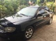 Kia Spectra   2004 - Bán xe cũ Kia Spectra đời 2004, màu đen, 175 triệu