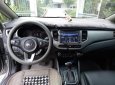 Kia Rondo 2.0 GAT 2016 - Cần bán xe Kia Rondo 2.0 GAT đời 2016, màu bạc xe gia đình, giá tốt