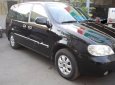 Kia Carnival GS 2007 - Bán xe Kia Carnival GS đời 2007, màu đen ít sử dụng giá cạnh tranh