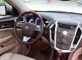 Cadillac SRX 4 2009 - Bán Cadillac SRX 4 đời 2009, màu vàng, nhập khẩu nguyên chiếc