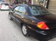 Kia Spectra LS 2003 - Cần bán xe Kia Spectra LS đời 2003, màu đen, giá 150tr