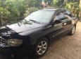 Kia Spectra   MT 2004 - Chính chủ bán Kia Spectra MT sản xuất 2004, màu đen