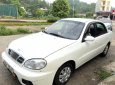 Daewoo Lanos LX 2004 - Cần bán Daewoo Lanos LX đời 2004, màu trắng xe gia đình