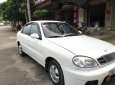 Daewoo Lanos LX 2004 - Cần bán Daewoo Lanos LX đời 2004, màu trắng xe gia đình