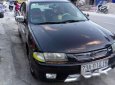 Mazda 323 1999 - Bán Mazda 323 năm 1999, màu đen xe gia đình, giá chỉ 145 triệu
