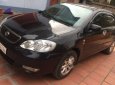 Toyota Corolla altis 1.8MT 2003 - Bán ô tô Toyota Corolla Altis 1.8MT đời 2003, màu đen còn mới