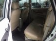 Toyota Innova E 2014 - Cần bán Toyota Innova E đời 2014, màu bạc số sàn, giá 670tr