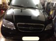 Kia Carnival GS 2006 - Bán Kia Carnival GS đời 2006, màu đen như mới, giá 255tr