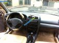 Mazda 323 1997 - Bán Mazda 323 đời 1997, màu vàng, nhập khẩu, giá 85tr