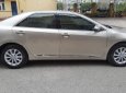 Toyota Camry 2.0 2015 - Bán Toyota Camry 2.0 năm 2015, màu vàng đẹp như mới, 930 triệu