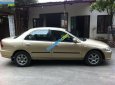 Mazda 323 1997 - Bán Mazda 323 đời 1997, màu vàng, nhập khẩu, giá 85tr