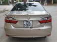 Toyota Camry 2.0 2015 - Bán Toyota Camry 2.0 năm 2015, màu vàng đẹp như mới, 930 triệu