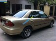 Mazda 323 1997 - Bán Mazda 323 đời 1997, màu vàng, nhập khẩu, giá 85tr