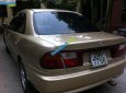 Mazda 323 1997 - Bán Mazda 323 đời 1997, màu vàng, nhập khẩu, giá 85tr