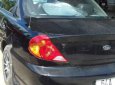 Kia Spectra 2004 - Cần bán gấp Kia Spectra đời 2004, màu đen xe gia đình