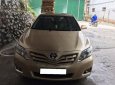 Toyota Camry LE 2010 - Cần bán xe Toyota Camry LE 2010, màu vàng, nhập khẩu