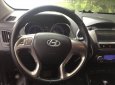 Hyundai Tucson   LX20  2010 - Bán xe cũ Hyundai Tucson LX20 đời 2010, màu đen