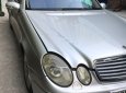 Mercedes-Benz E240 2004 - Xe Mercedes E240 đời 2004, màu bạc số tự động, giá chỉ 320 triệu