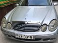 Mercedes-Benz E240 2004 - Xe Mercedes E240 đời 2004, màu bạc số tự động, giá chỉ 320 triệu