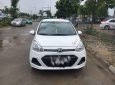 Hyundai Grand i10 2015 - Cần bán xe Hyundai Grand i10 đời 2015, màu trắng xe gia đình, 350 triệu