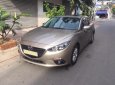 Mazda 3 2016 - Bán chiếc Mazda 3 2016 sedan dáng thể thao màu vàng cát