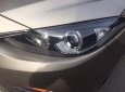 Mazda 3 2016 - Bán chiếc Mazda 3 2016 sedan dáng thể thao màu vàng cát