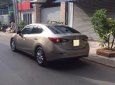 Mazda 3 2016 - Bán chiếc Mazda 3 2016 sedan dáng thể thao màu vàng cát