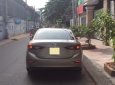 Mazda 3 2016 - Bán chiếc Mazda 3 2016 sedan dáng thể thao màu vàng cát