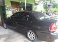 Mitsubishi Lancer GLX 1.6MT 2003 - Cần bán gấp Mitsubishi Lancer GLX 1.6MT đời 2003, màu đen, xe nhập chính chủ, 200tr