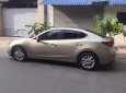 Mazda 3 2016 - Bán chiếc Mazda 3 2016 sedan dáng thể thao màu vàng cát
