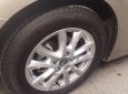 Mazda 3 2016 - Bán chiếc Mazda 3 2016 sedan dáng thể thao màu vàng cát