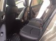 Mazda 3 2016 - Bán chiếc Mazda 3 2016 sedan dáng thể thao màu vàng cát
